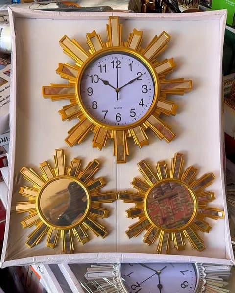 Sunbursts clock and mirror set