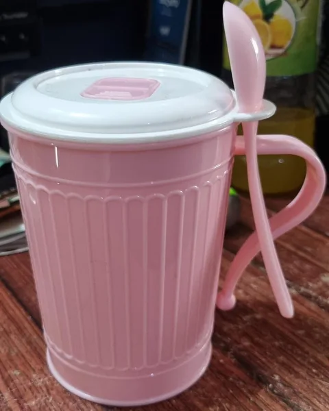Cup with spoon